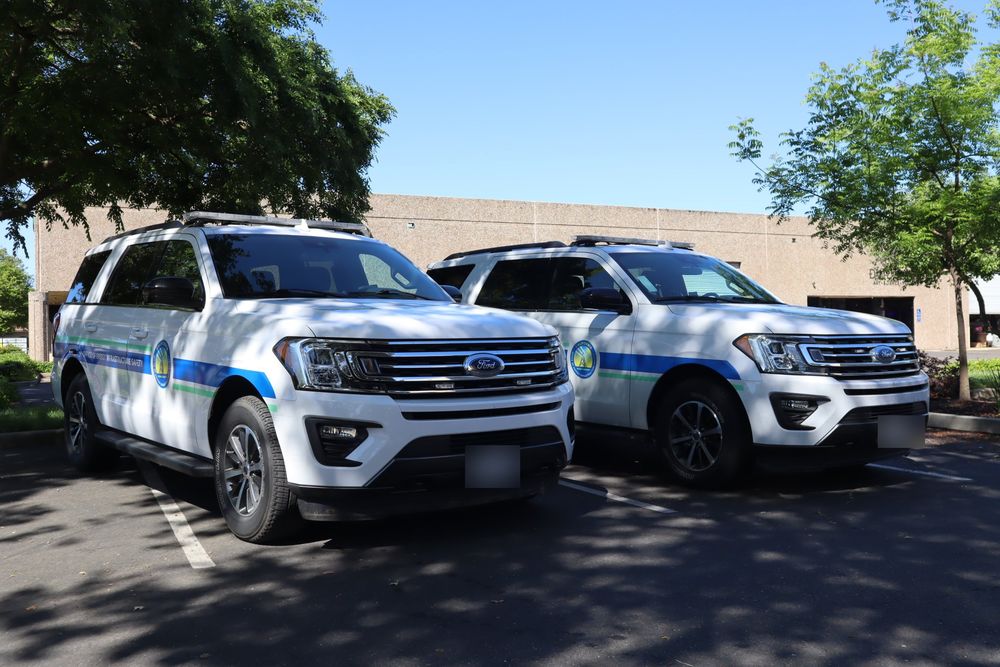 Two California state agency Ford Expeditions with custom decals by Drift Wraps in Rancho Cordova