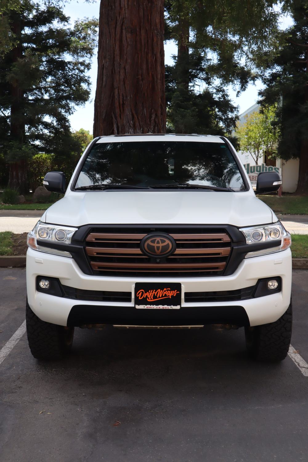 Front of a 2016 Toyota Land Cruiser with full-body matte PPF over custom graphics by Drift Wraps in Rancho Cordova