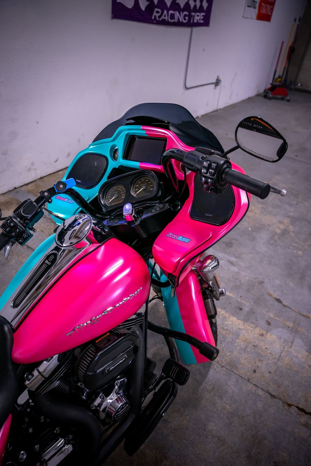 Top view of a Harley-Davidson Road Glide with a half pink, half teal themed wrap by Drift Wraps