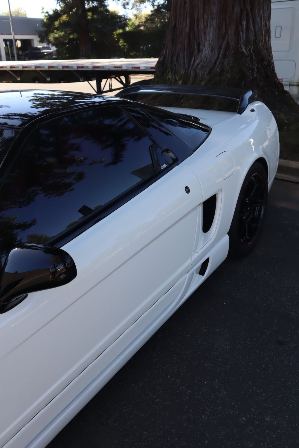 Tinted side windows on a white Acura NSX with LLumar ceramic window tint by Drift Wraps in Rancho Cordova