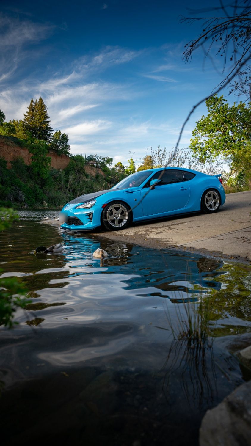 2019 Toyota 86 wrapped in Aura Ultra Gloss Laguna Blue vinyl by Drift Wraps in Rancho Cordova by the river